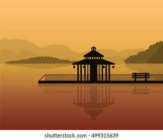 landscape - silhouette on a background of mountains, sky with reflection in water.