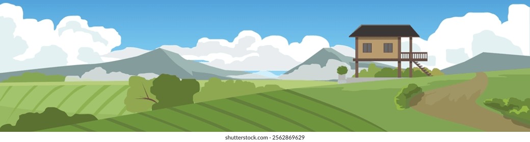 Landscape small house on stilts sits nestled among the field. Peaceful rural scene. With rolling green fields a dirt path. Distant mountains under a blue sky with fluffy clouds. For banner background.