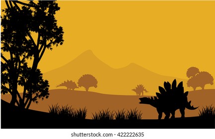 Landscape of stegosaurus silhouette at the afternoon