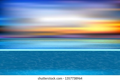 landscape of swimming pool at the beach in sunset