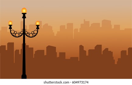 Landscape of urban silhouette with street lamp