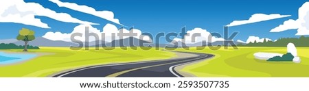 Landscape view of asphalt road that cuts through the grasslands. Road curves on the grassy slopes. Trees growing next to the water source. Background of mountains under blue sky and white clouds.