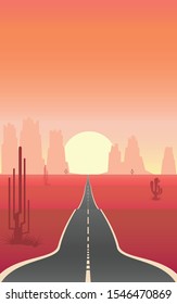 Landscape view of the local road in the center of desert area with rocky mountain range in the background and the sun while sunset time in orange warm color tone