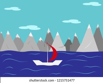 Landscape. Yacht with a red sail in the sea against the mountains with snow-capped peaks