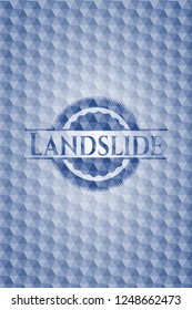 Landslide blue badge with geometric pattern.