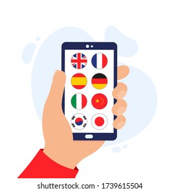 Language panel for a mobile application. App for learning foreign languages. Online course for learning foreign languages on the phone. Hand holding a smartphone.