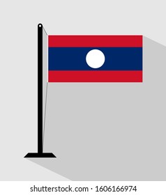 laos flag on pole, isolated on gray background