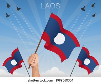 Laos flags fluttering under the blue sky