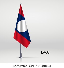 Laos hanging flag on flagpole