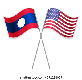 Laotian and American crossed flags. Laos combined with United States of America isolated on white. Language learning, international business or travel concept.