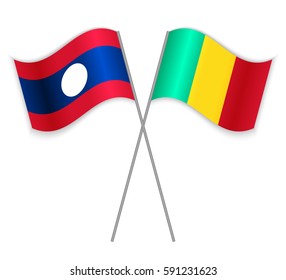 Laotian and Guinean crossed flags. Laos combined with Guinea isolated on white. Language learning, international business or travel concept.