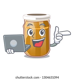 With laptop almond butter in a character jar
