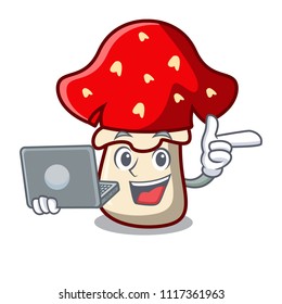 With laptop amanita mushroom character cartoon