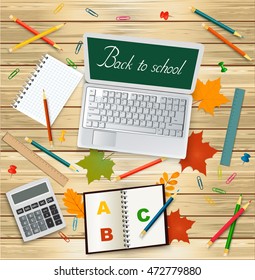 Laptop with back to school message, calculator, autumn leaves and school supplies on wooden background - top view. Vector illustration.
