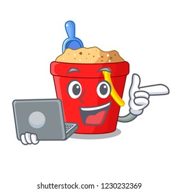 With laptop beach bucket shape with sand cartoon