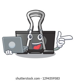 With laptop binder clip in the character shape