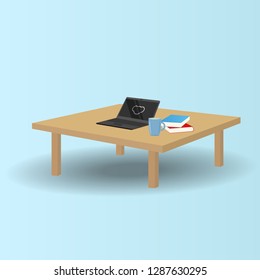 Laptop and Book on the table