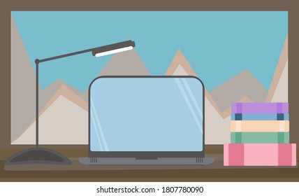 Laptop mit Büchern auf dem Tisch