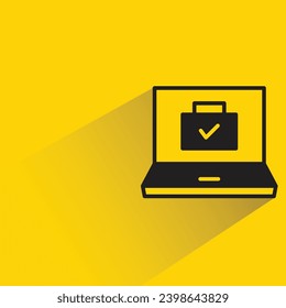 laptop and briefcase icon with shadow on yellow background