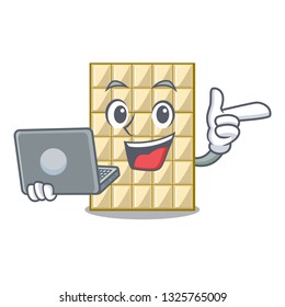 With laptop chocolate white in the shape character
