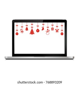 Laptop with Christmas hanging ornaments