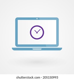 Laptop and clock