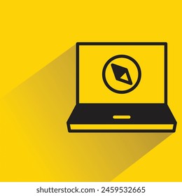 laptop and compass icon with shadow on yellow background