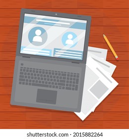 laptop computer with business documents