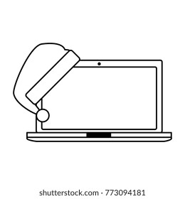 laptop computer with christmas hat