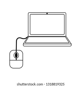 Laptop computer with mouse in black and white
