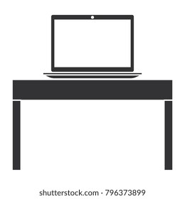 laptop computer in table