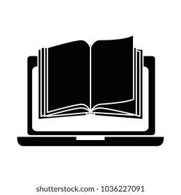laptop computer with textbook
