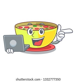 With laptop corn chowder in a cartoon bowl