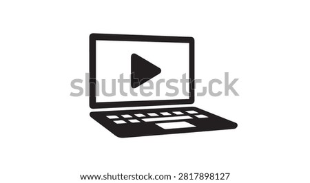 Laptop displays a play icon representing media playback main subject focused