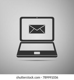 Laptop with envelope and open email on screen icon isolated on grey background. Email marketing, internet advertising concepts. Flat design. Vector Illustration