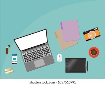 Laptop flat design with files, camera, mobile phone, USB and coffee on green color table