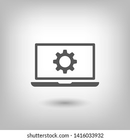 laptop and gear icon. Vector web design