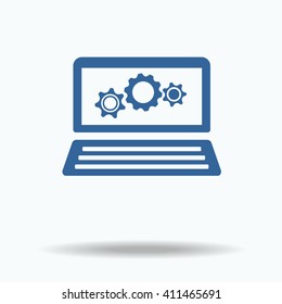 laptop and gears vector icon