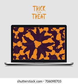 Laptop with Halloween Bats Illustration and Trick or Treat Text.