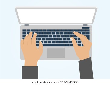 laptop and hands on the keyboard and light background
