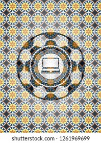 laptop icon inside arabic style badge. Arabesque decoration.