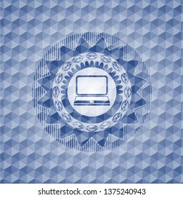 laptop icon inside blue emblem or badge with abstract geometric polygonal pattern background.