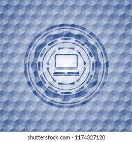 laptop icon inside blue hexagon badge.