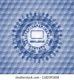 laptop icon inside blue hexagon badge.