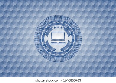 laptop icon inside blue hexagon badge.