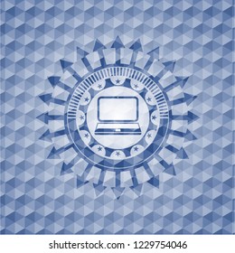 laptop icon inside blue polygonal badge.