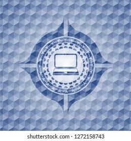 laptop icon inside blue polygonal badge.