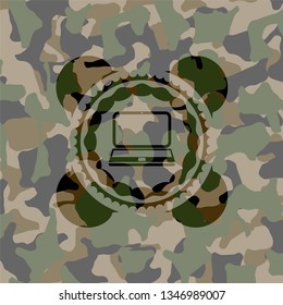 laptop icon inside camo texture