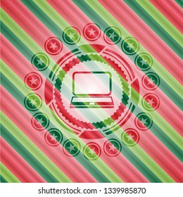 laptop icon inside christmas colors badge.