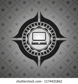laptop icon inside dark emblem. Retro